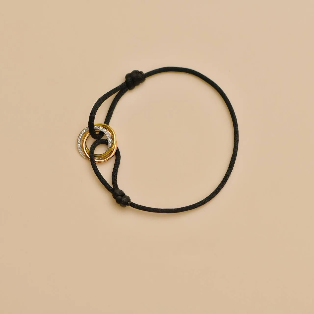 Cartier Trinity Diamond 18K Yellow White and Rose Gold Black Cord Bracelet