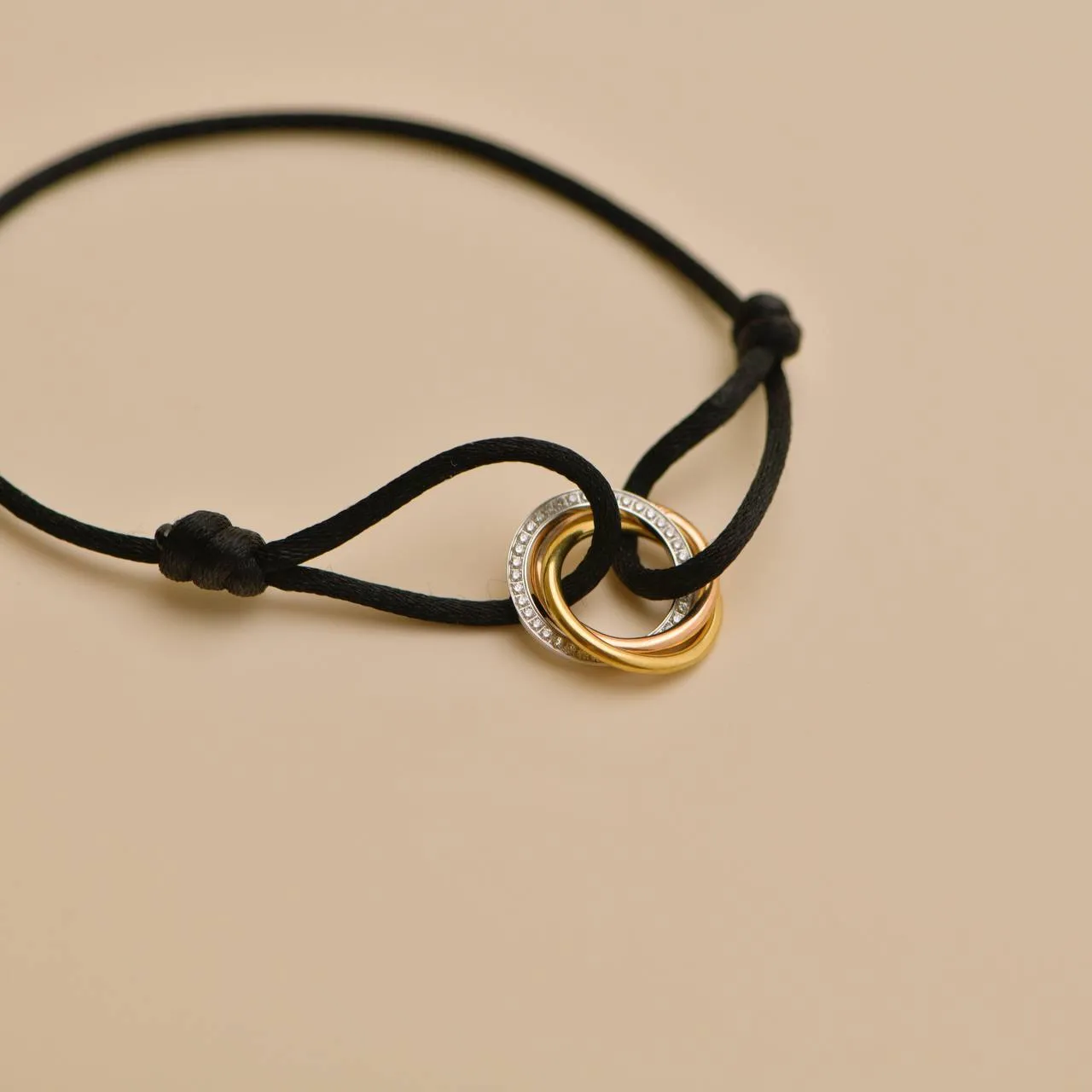 Cartier Trinity Diamond 18K Yellow White and Rose Gold Black Cord Bracelet