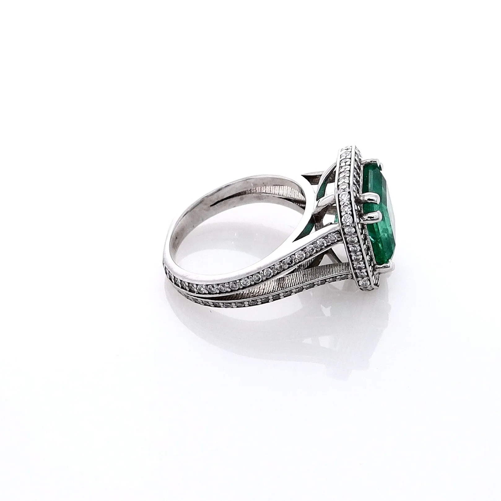 Estate Jewelery 18k White Gold Emerald and Diamond Halo Split Shank Ring