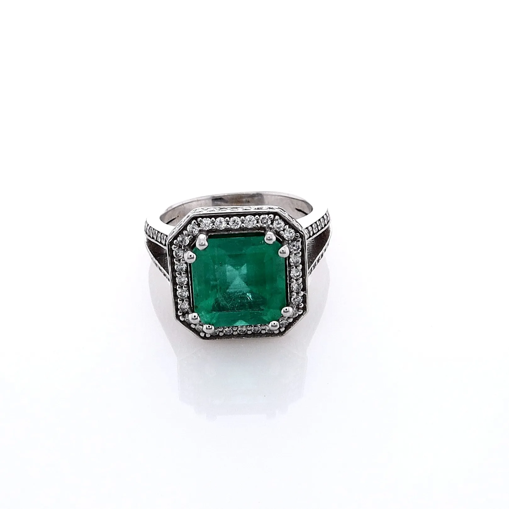 Estate Jewelery 18k White Gold Emerald and Diamond Halo Split Shank Ring