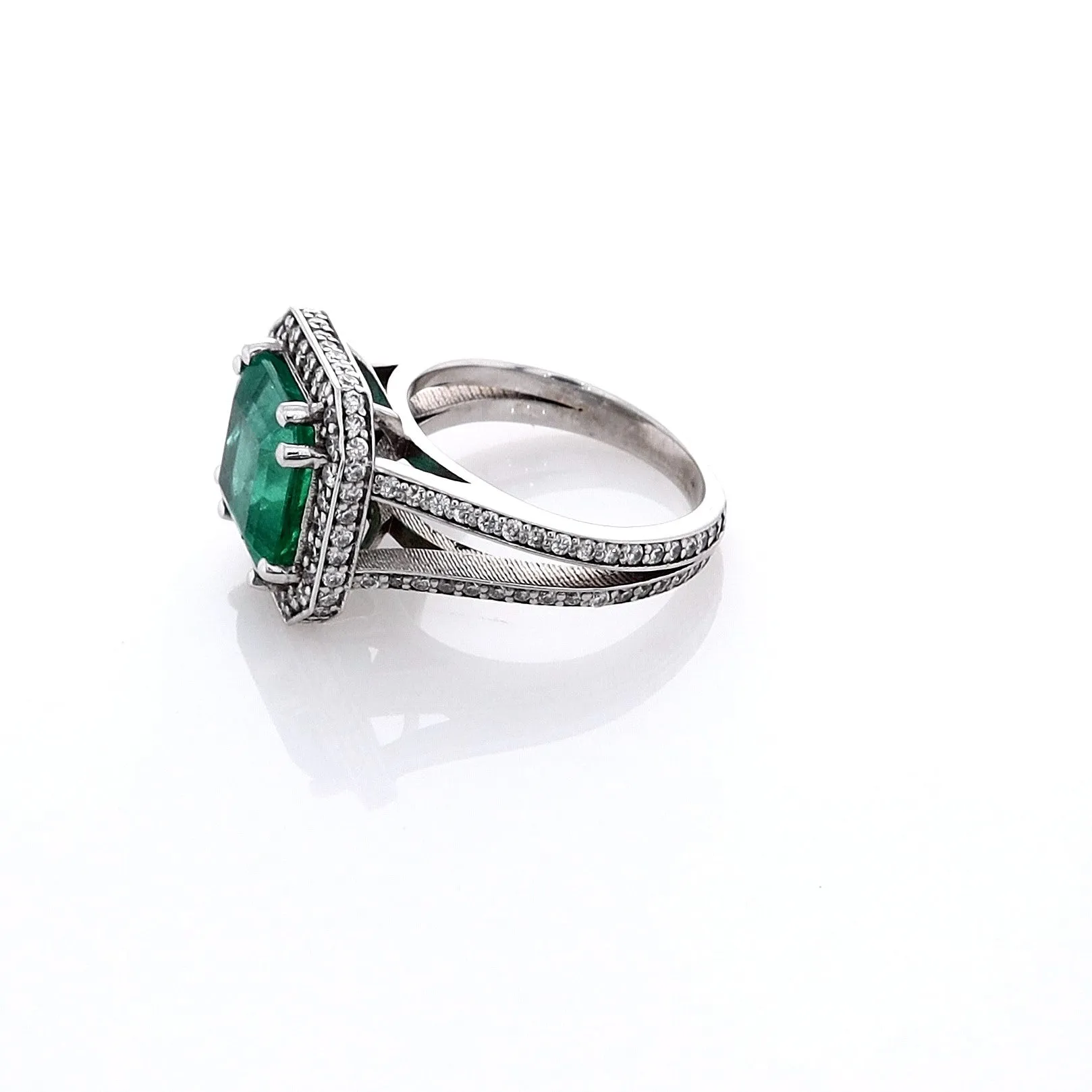 Estate Jewelery 18k White Gold Emerald and Diamond Halo Split Shank Ring