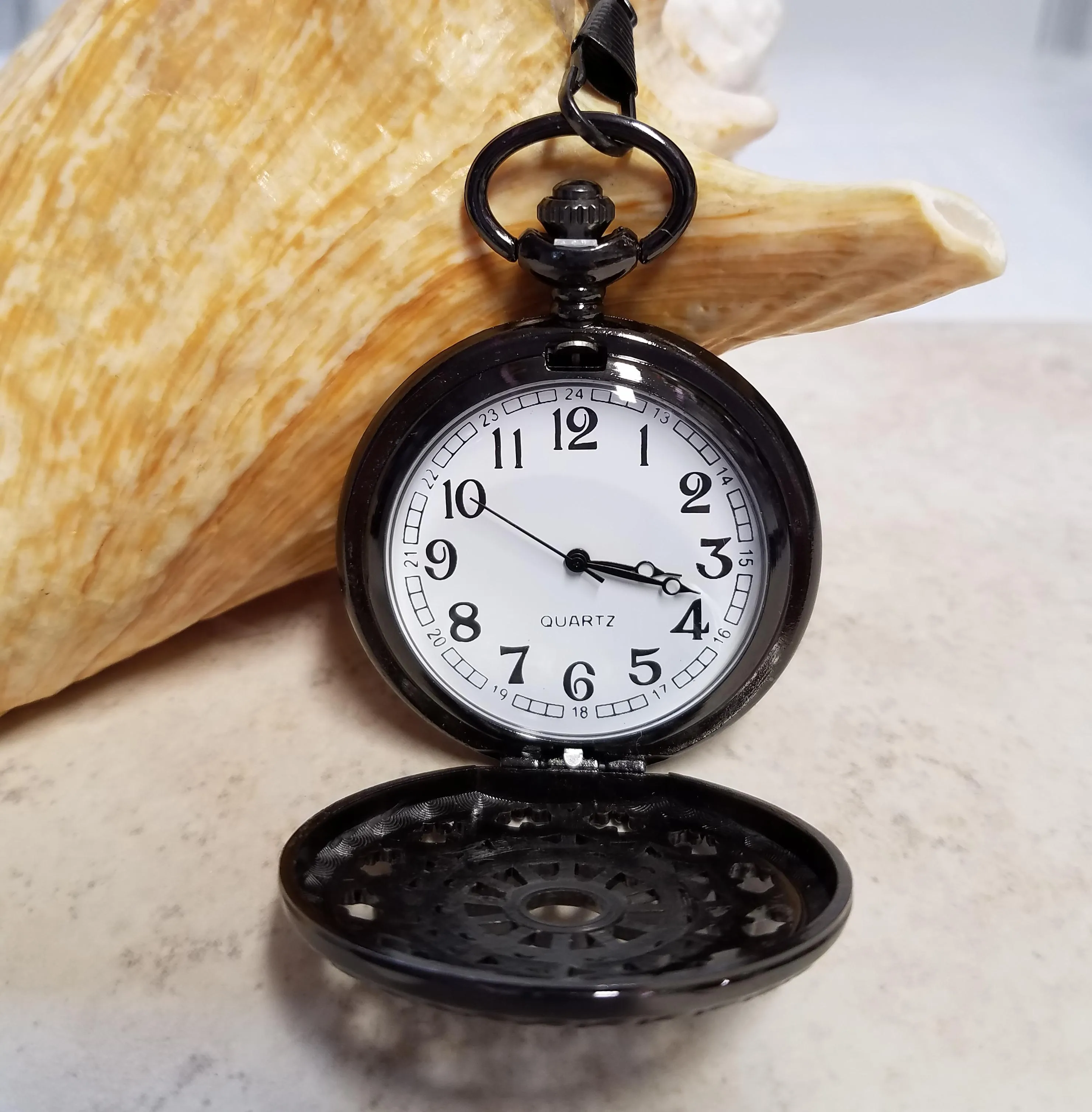 Mermaid battery operated pocket watch.